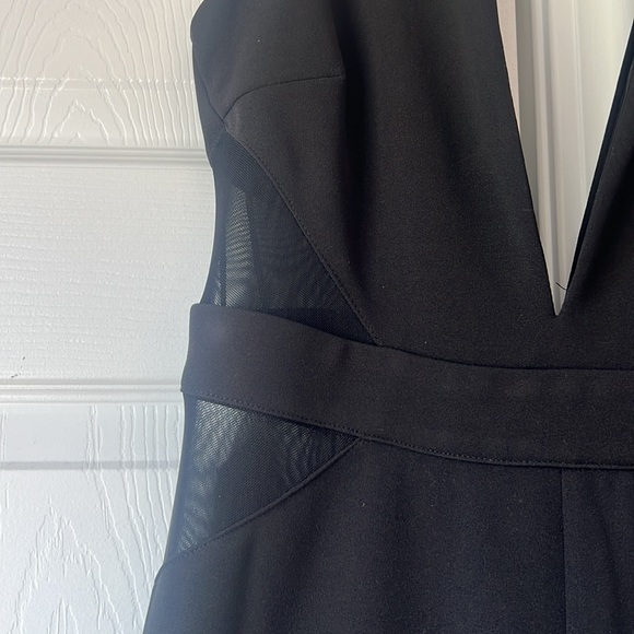 NWT - Vici Dolls Black Jumpsuit with Mesh Sides Flared Legs - Size L runs small - Picture 3 of 4